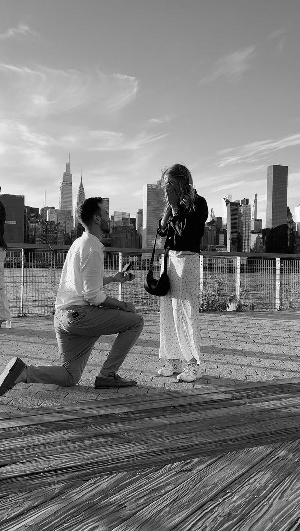 groom on one knee